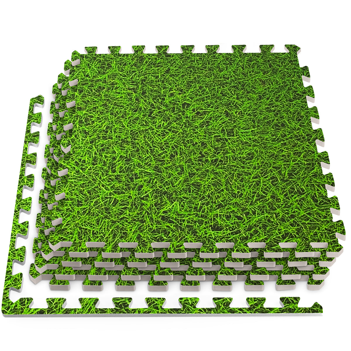 Grass design foam floor tiles stacked in a playful arrangement on a white background, showcasing vibrant green color.