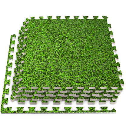 Grass design foam floor tiles stacked in a playful arrangement on a white background, showcasing vibrant green color.
